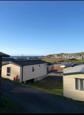 Experience Coastal Bliss in Our Modern 2019 Sea Viev 2 Bedroom static caravan at Clarach Bay Holiday Village!